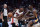 MIAMI, FLORIDA - MARCH 22: Jimmy Butler #22 of the Miami Heat dribbles the ball against Zion Williamson #1 of the New Orleans Pelicans during the second quarter at Kaseya Center on March 22, 2024 in Miami, Florida. NOTE TO USER: User expressly acknowledges and agrees that, by downloading and or using this photograph, User is consenting to the terms and conditions of the Getty Images License Agreement. (Photo by Rich Storry/Getty Images)