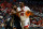 PITTSBURGH, PENNSYLVANIA - MARCH 23: DJ Burns Jr. #30 of the North Carolina State Wolfpack goes to the basket against Tuburu Naivalurua #12 of the Oakland Golden Grizzlies in the first half during the second round of the 2024 NCAA Men's Basketball Tournament held at PPG PAINTS Arena on March 23, 2024 in Pittsburgh, Pennsylvania. (Photo by Justin K. Aller/NCAA Photos via Getty Images)
