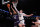 NEW YORK, NEW YORK - MARCH 24: Donovan Clingan #32 of the Connecticut Huskies defends against Blake Preston #32 of the Northwestern Wildcats during the first half in the second round of the NCAA Men's Basketball Tournament at Barclays Center on March 24, 2024 in New York City. (Photo by Elsa/Getty Images)