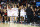 SPOKANE, WASHINGTON - MARCH 24: Lamont Butler #5 and bench players of the San Diego State Aztecs celebrate in the first half against Yale Bulldogs during the second round of the 2024 NCAA Men's Basketball Tournament held at Spokane Veterans Memorial Arena on March 24, 2024 in Spokane, Washington. (Photo by C. Morgan Engel/NCAA Photos via Getty Images)