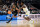 INDIANAPOLIS, INDIANA - MARCH 24: Cody Williams #10 of the Colorado Buffaloes drives the ball against Kam Jones #1 of the Marquette Golden Eagles during the second round of the 2024 NCAA Men's Basketball Tournament held at Gainbridge Fieldhouse on March 24, 2024 in Indianapolis, Indiana. (Photo by Ben Solomon/NCAA Photos via Getty Images)