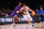 NEW YORK, NEW YORK - MARCH 24: Kyle Filipowski #30 of the Duke Blue Devils is guarded by during the second round of the NCAA Men’s Basketball Tournament at Barclays Center on March 24, 2024 in New York City. (Photo by Jamie Schwaberow/NCAA Photos via Getty Images)