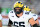 COLLEGE PARK, MARYLAND - NOVEMBER 18: Zak Zinter #65 of the Michigan Wolverines warms up before the game against the Maryland Terrapins at SECU Stadium on November 18, 2023 in College Park, Maryland. (Photo by G Fiume/Getty Images)