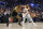 SAN FRANCISCO, CALIFORNIA - FEBRUARY 10: Kevin Durant #35 of the Phoenix Suns is guarded by Jonathan Kuminga #00 of the Golden State Warriors in the first quarter at Chase Center on February 10, 2024 in San Francisco, California. NOTE TO USER: User expressly acknowledges and agrees that, by downloading and or using this photograph, User is consenting to the terms and conditions of the Getty Images License Agreement. (Photo by Lachlan Cunningham/Getty Images)