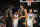 CLEVELAND, OHIO - NOVEMBER 05: Caris LeVert #3 celebrates with Jarrett Allen #31 of the Cleveland Cavaliers during the fourth quarter against the Golden State Warriors at Rocket Mortgage Fieldhouse on November 05, 2023 in Cleveland, Ohio. The Cavaliers defeated the Warriors 115-104. NOTE TO USER: User expressly acknowledges and agrees that, by downloading and or using this photograph, User is consenting to the terms and conditions of the Getty Images License Agreement. (Photo by Jason Miller/Getty Images)
