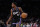 WASHINGTON, DC - MARCH 21: Malik Monk #0 of the Sacramento Kings dribbles the ball against the Washington Wizards during the second half at Capital One Arena on March 21, 2024 in Washington, DC. NOTE TO USER: User expressly acknowledges and agrees that, by downloading and or using this photograph, User is consenting to the terms and conditions of the Getty Images License Agreement. (Photo by Patrick Smith/Getty Images)