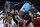 DALLAS, TEXAS - MARCH 31: Head coach Kevin Keatts of the North Carolina State Wolfpack is doused with confetti as players celebrate after the Wolfpack defeated the Duke Blue Devils to advance to the Final Four after the Elite 8 round of the NCAA Men's Basketball Tournament at American Airlines Center on March 31, 2024 in Dallas, Texas. (Photo by Carmen Mandato/Getty Images)