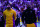 INDIANAPOLIS, INDIANA - MARCH 29: Anthony Davis #3 and LeBron James #23 of the Los Angeles Lakers stand for the singing of the national anthem before the game against the Indiana Pacers at Gainbridge Fieldhouse on March 29, 2024 in Indianapolis, Indiana. NOTE TO USER: User expressly acknowledges and agrees that, by downloading and or using this photograph, User is consenting to the terms and conditions of the Getty Images License Agreement. (Photo by Dylan Buell/Getty Images)