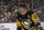PITTSBURGH, PA - MARCH 26: Pittsburgh Penguins center Sidney Crosby (87) looks on during the second period in the NHL game between the Pittsburgh Penguins and the Carolina Hurricanes on March 26, 2024, at PPG Paints Arena in Pittsburgh, PA. (Photo by Jeanine Leech/Icon Sportswire via Getty Images)