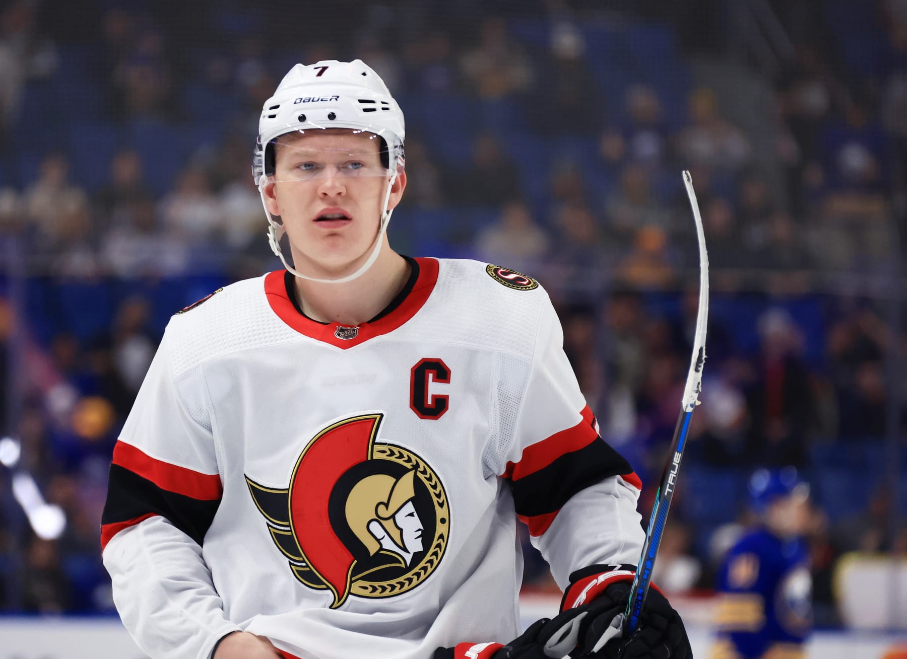 BUFFALO, NEW YORK - MARCH 27: Brady Tkachuk #7 of the Ottawa Senators prepares for a faceoff against the Buffalo Sabres during an NHL game on March 27, 2024 at KeyBank Center in Buffalo, New York. (Photo by Bill Wippert/NHLI via Getty Images)