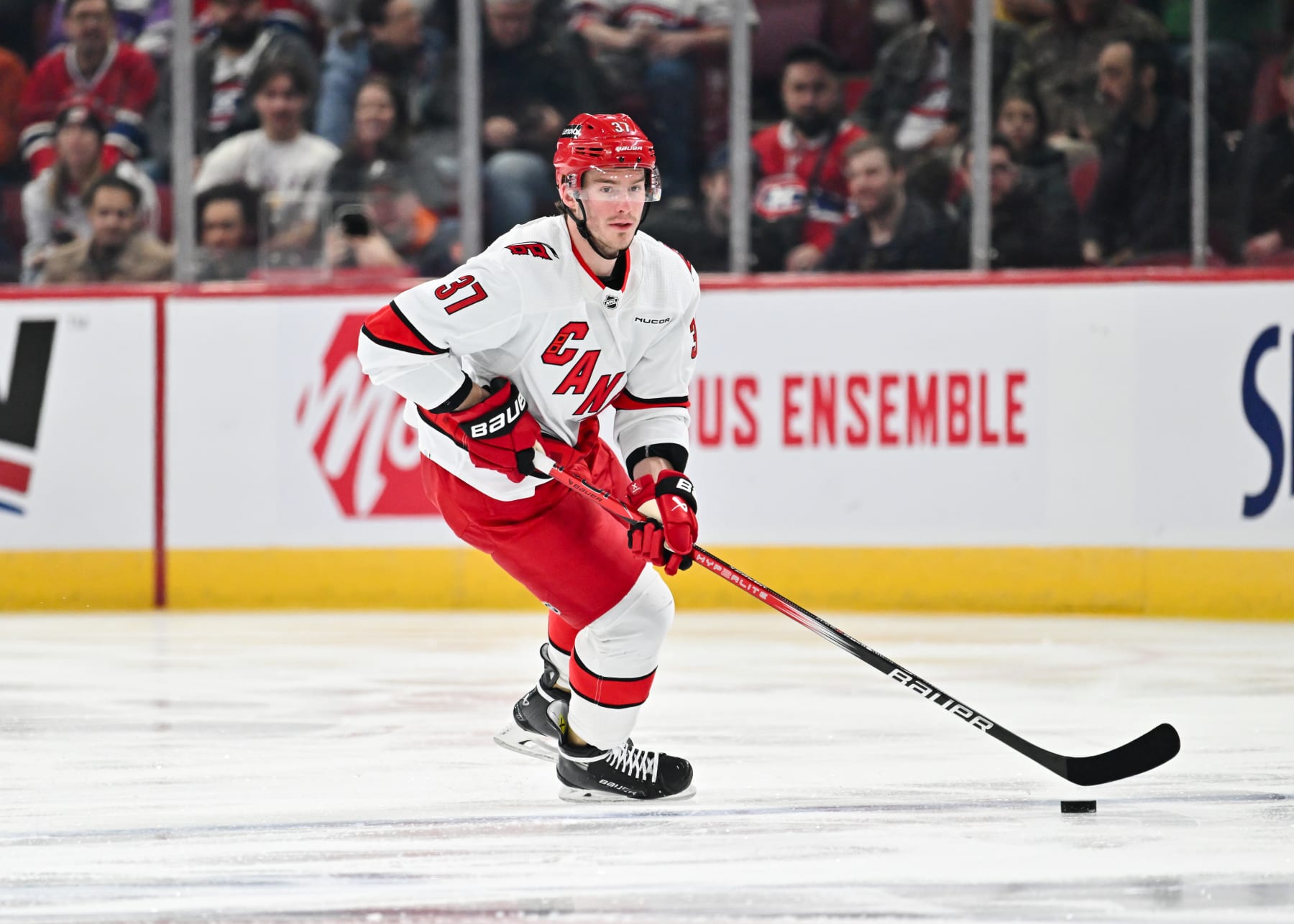 MONTREAL, CANADA - MARCH 30:  Andrei Svechnikov #37 of the Carolina Hurricanes skates the puck during the first period against the Montreal Canadiens at the Bell Centre on March 30, 2024 in Montreal, Quebec, Canada.  The Carolina Hurricanes defeated the Montreal Canadiens 3-0.  (Photo by Minas Panagiotakis/Getty Images)