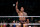 PHILADELPHIA, PENNSYLVANIA - APRIL 06: Dwayne "The Rock" Johnson reacts during a tag team fight against Cody Rhodes and Seth "Freakin" Rollins during Night One of WrestleMania 40 at Lincoln Financial Field on April 06, 2024 in Philadelphia, Pennsylvania. (Photo by Tim Nwachukwu/Getty Images)
