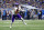 DETROIT, MICHIGAN - JANUARY 07: Justin Jefferson #18 of the Minnesota Vikings runs the ball up the field after a catch during the first half of a game against the Detroit Lions at Ford Field on January 07, 2024 in Detroit, Michigan. (Photo by Mike Mulholland/Getty Images)