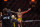 Charles Oliveira celebrates his victory over Beneil Dariush.
