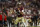 TALLAHASSEE, FLORIDA - NOVEMBER 11: Jordan Travis #13 of the Florida State Seminoles throws a pass during the second half of a game against the Miami Hurricanes at Doak Campbell Stadium on November 11, 2023 in Tallahassee, Florida. (Photo by James Gilbert/Getty Images)