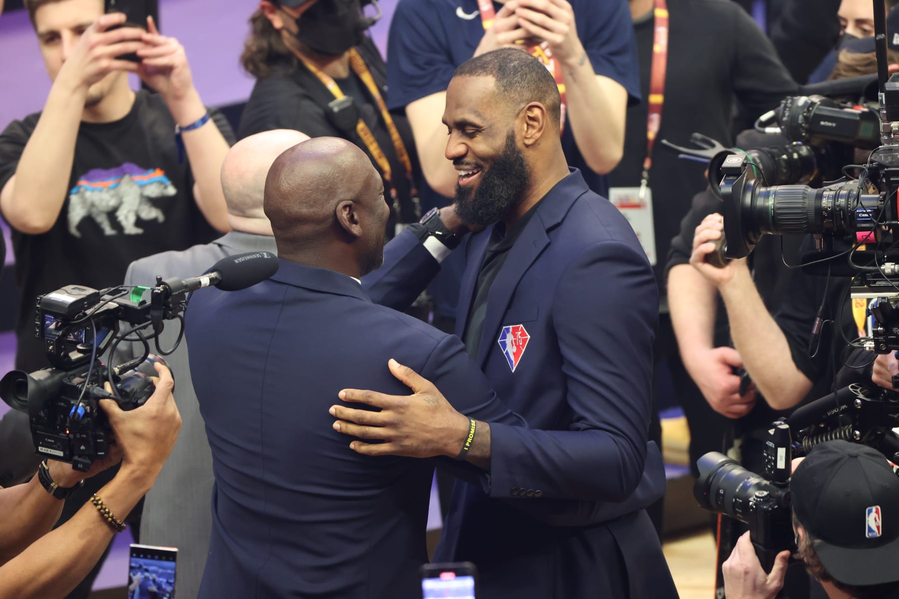 CLEVELAND, OH - FEBRUARY 20: NBA legend Michael Jordan greets LeBron James #6 of the Los Angeles Lakers during the 2022 NBA All-Star Game as part of 2022 NBA All-Star Weekend on February 20, 2022 at Rocket Mortgage FieldHouse in Cleveland, Ohio. NOTE TO USER: User expressly acknowledges and agrees that, by downloading and or using this photograph, User is consenting to the terms and conditions of the Getty Images License Agreement. Mandatory Copyright Notice: Copyright 2022 NBAE (Photo by Joe Murphy/NBAE via Getty Images)