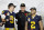 PASADENA, CALIFORNIA - JANUARY 01: J.J. McCarthy #9, head coach Jim Harbaugh, and Blake Corum #2 of the Michigan Wolverines celebrate after beating the Alabama Crimson Tide 27-20 in overtime to win the CFP Semifinal Rose Bowl Game at Rose Bowl Stadium on January 01, 2024 in Pasadena, California. (Photo by Kevork Djansezian/Getty Images)