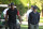 AUGUSTA, GEORGIA - APRIL 14: Tiger Woods and his son Charlie arrive for the final round of  Masters Tournament at Augusta National Golf Club on April 14, 2024 in Augusta, Georgia. (Photo by Ben Jared/PGA TOUR via Getty Images)
