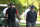AUGUSTA, GEORGIA - APRIL 14: Tiger Woods and his son Charlie arrive for the final round of Masters Tournament at Augusta National Golf Club on April 14, 2024 in Augusta, Georgia. (Photo by Ben Jared/PGA TOUR via Getty Images)