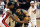 Miami, FL - April 29: Miami Heat forward Haywood Highsmith and guard Jaime Jaquez Jr. put pressure on Boston Celtics forward Jayson Tatum in the first quarter. (Photo by Danielle Parhizkaran/The Boston Globe via Getty Images)