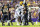 BATON ROUGE, LA - OCTOBER 21: LSU Tigers defensive end Ovie Oghoufo (2) recovers a fumble during a game between the LSU Tigers and the Army Black Knights on October 21, 2023, at Tiger Stadium in Baton Rouge, Louisiana. (Photo by John Korduner/Icon Sportswire via Getty Images)
