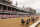LOUISVILLE, KENTUCKY - MAY 06: The field heads to the first turn during the 149th running of the Kentucky Derby at Churchill Downs on May 06, 2023 in Louisville, Kentucky. (Photo by Michael Reaves/Getty Images)
