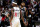 MIAMI, FLORIDA - DECEMBER 08: Jimmy Butler #22 of the Miami Heat and Paul George #13 of the LA Clippers meet on the court after their game at FTX Arena on December 08, 2022 in Miami, Florida. NOTE TO USER: User expressly acknowledges and agrees that, by downloading and or using this photograph, User is consenting to the terms and conditions of the Getty Images License Agreement. (Photo by Megan Briggs/Getty Images)