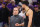 PHOENIX, ARIZONA - APRIL 28: Head coach Frank Vogel of the Phoenix Suns talks with Devin Booker #1 during the second half of game four of the Western Conference First Round Playoffs at Footprint Center on April 28, 2024 in Phoenix, Arizona. The Timberwolves defeated the Suns 122-116 and win the series 4-0.  NOTE TO USER: User expressly acknowledges and agrees that, by downloading and or using this photograph, User is consenting to the terms and conditions of the Getty Images License Agreement.  (Photo by Christian Petersen/Getty Images)
