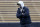 BOULDER, COLORADO - APRIL 27: Head coach Deion Sanders of the Colorado Buffaloes watches as his team warms-up prior to their spring game at Folsom Field on April 27, 2024 in Boulder, Colorado.  (Photo by Matthew Stockman/Getty Images)