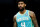 CHARLOTTE, NORTH CAROLINA - APRIL 09: Nick Richards #4 of the Charlotte Hornets looks on during the first half of an NBA game against the Dallas Mavericks at Spectrum Center on April 09, 2024 in Charlotte, North Carolina. NOTE TO USER: User expressly acknowledges and agrees that, by downloading and or using this photograph, User is consenting to the terms and conditions of the Getty Images License Agreement. (Photo by David Jensen/Getty Images)