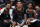 WASHINGTON, DC - FEBRUARY 02: (L-R) Tyus Jones #5, Kyle Kuzma #33, and Jordan Poole #13 of the Washington Wizards look on from the bench /H during the first half at Capital One Arena on February 2, 2024 in Washington, DC. NOTE TO USER: User expressly acknowledges and agrees that, by downloading and or using this photograph, User is consenting to the terms and conditions of the Getty Images License Agreement. (Photo by Patrick Smith/Getty Images)