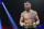 LAS VEGAS, NEVADA - MAY 20: Vasyl Lomachenko of Ukraine looks on against Devin Haney during their undisputed lightweight title bout at MGM Grand Garden Arena on May 20, 2023 in Las Vegas, Nevada. (Photo by Sarah Stier/Getty Images)