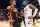 ATLANTA, GA - MARCH 28: Donovan Mitchell #45 of the Cleveland Cavaliers and Trae Young #11 of the Atlanta Hawks embrace after the game on March 28, 2023 at State Farm Arena in Atlanta, Georgia.  NOTE TO USER: User expressly acknowledges and agrees that, by downloading and/or using this Photograph, user is consenting to the terms and conditions of the Getty Images License Agreement. Mandatory Copyright Notice: Copyright 2023 NBAE (Photo by Scott Cunningham/NBAE via Getty Images)