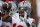 PISCATAWAY, NEW JERSEY - NOVEMBER 4: Wide receiver Marvin Harrison Jr. #18 of the Ohio State Buckeyes warms up on the sidelines during a college football game against the Rutgers Scarlet Knights at SHI Stadium on November 4, 2023 in Piscataway, New Jersey. (Photo by Rich Schultz/Getty Images)