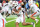 NASHVILLE, TENNESSEE - DECEMBER 30: Brian Battie #21 of the Auburn Tigers runs the ball against the Maryland Terrapins in the first half of the TransPerfect Music City Bowl at Nissan Stadium on December 30, 2023 in Nashville, Tennessee. (Photo by Carly Mackler/Getty Images)