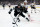 LOS ANGELES, CALIFORNIA - APRIL 18: Pierre-Luc Dubois #80 of the Los Angeles Kings turns for the puck in front of Jarred Tinordi #25 of the Chicago Blackhawks during the second period at Crypto.com Arena on April 18, 2024 in Los Angeles, California. (Photo by Harry How/Getty Images)