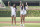 CHICAGO, ILLINOIS - MAY 21: Angel Reese and Kamilla Cardoso of the Chicago Sky throw out a ceremonial first pitch before a game between the Atlanta Braves and Chicago Cubs at Wrigley Field on May 21, 2024 in Chicago, Illinois. (Photo by Griffin Quinn/Getty Images)