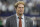 ARLINGTON, TEXAS - NOVEMBER 12: Football broadcaster Greg Olsen walks the field before the game between the New York Giants and Dallas Cowboys at AT&T Stadium on November 12, 2023 in Arlington, Texas. (Photo by Sam Hodde/Getty Images)