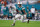 MIAMI GARDENS, FLORIDA - DECEMBER 24: Tyreek Hill #10 of the Miami Dolphins carries the ball against the Dallas Cowboys during the fourth quarter of the game at Hard Rock Stadium on December 24, 2023 in Miami Gardens, Florida. (Photo by Megan Briggs/Getty Images)