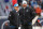 CHICAGO, ILLINOIS - DECEMBER 10: Head coach Dan Campbell of the Detroit Lions speaks with offensive coordinator Ben Johnson prior to the game against the Chicago Bears at Soldier Field on December 10, 2023 in Chicago, Illinois. (Photo by Michael Reaves/Getty Images)