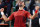 Serbia's Novak Djokovic celebrates after winning against Italy's Lorenzo Musetti with a timer reading 4 hours and 28 minutes at the end of their men's singles match on Court Philippe-Chatrier on day seven of the French Open tennis tournament at the Roland Garros Complex in Paris on June 2, 2024. (Photo by EMMANUEL DUNAND / AFP) (Photo by EMMANUEL DUNAND/AFP via Getty Images)