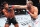 NEWARK, NEW JERSEY - JUNE 01: (R-L) Sean Strickland punches Paulo Costa of Brazil in a middleweight fight during the UFC 302 event at Prudential Center on June 01, 2024 in Newark, New Jersey. (Photo by Jeff Bottari/Zuffa LLC via Getty Images)