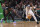 Boston, MA - March 1: Dallas Mavericks guard Kyrie Irving recovers a loose ball in front of Boston Celtics guard Jrue Holiday in the second quarter. The Celtics beat the Mavericks, 138-110. (Photo by Matthew J. Lee/The Boston Globe via Getty Images)