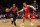 HOUSTON, TEXAS - MARCH 21: DeMar DeRozan #11 of the Chicago Bulls drives to the basket against Dillon Brooks #9 of the Houston Rockets in the second half at Toyota Center on March 21, 2024 in Houston, Texas.  NOTE TO USER: User expressly acknowledges and agrees that, by downloading and or using this photograph, User is consenting to the terms and conditions of the Getty Images License Agreement. (Photo by Tim Warner/Getty Images)