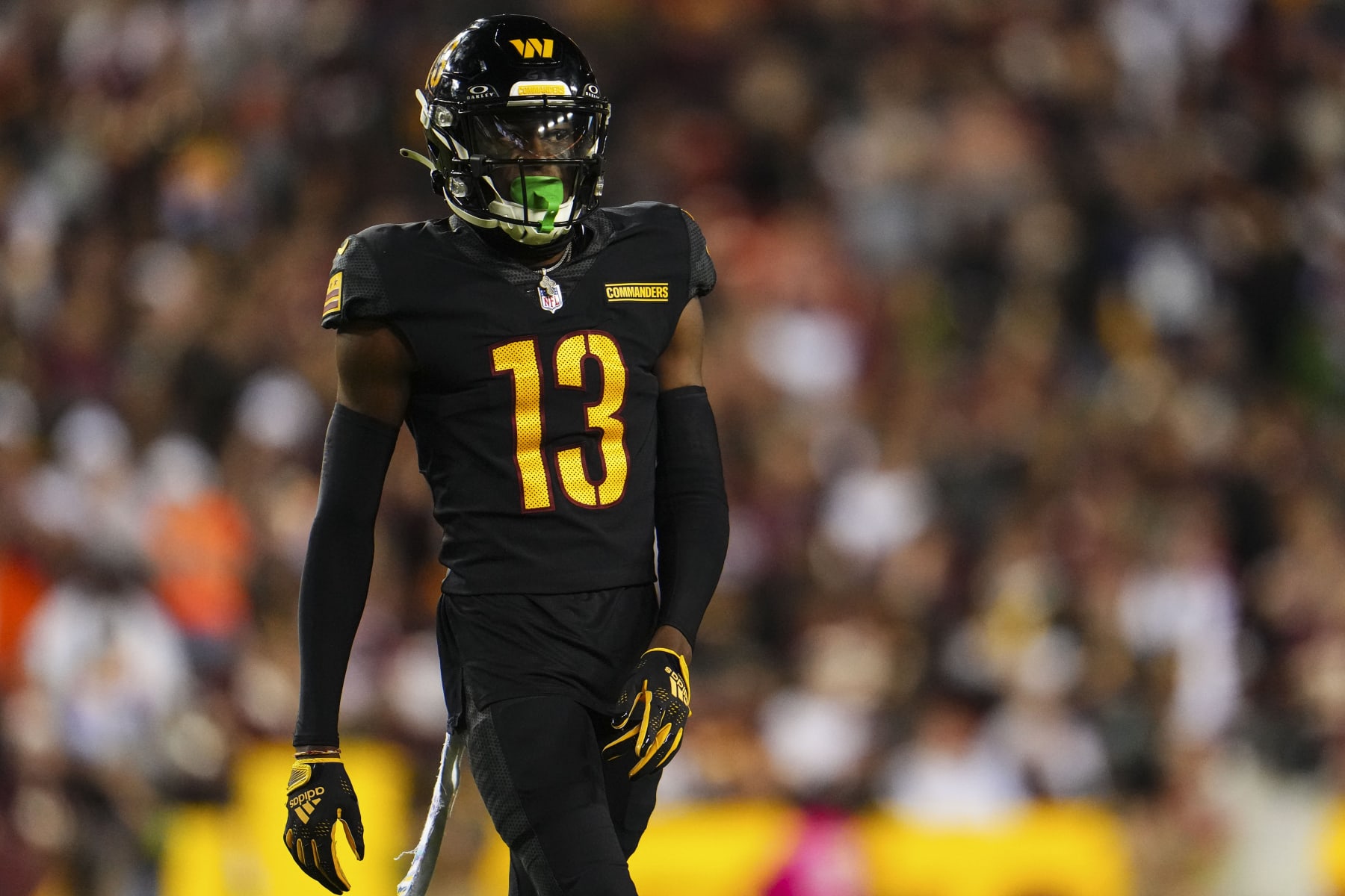 LANDOVER, MD - OCTOBER 05: Emmanuel Forbes #13 of the Washington Commanders looks on from the field during an NFL game against the Chicago Bears at FedEx Field on October 5, 2023 in Landover, Maryland. (Photo by Cooper Neill/Getty Images)