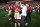 SANTA CLARA, CALIFORNIA - JANUARY 28: Brock Purdy #13 of the San Francisco 49ers celebrates with Head coach Kyle Shanahan after defeating the Detroit Lions 34-31 in the NFC Championship Game at Levi's Stadium on January 28, 2024 in Santa Clara, California. (Photo by Ezra Shaw/Getty Images)