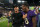 Baltimore Ravens head coach John Harbaugh (left) and quarterback Lamar Jackson (right)
