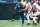 CHARLOTTE, NC - DECEMBER 17: Kaden Elliss #55 of the Atlanta Falcons tackles Miles Sanders #6 of the Carolina Panthers during an NFL game at Bank of America Stadium in Charlotte, North Carolina on Dec 17, 2023. (Photo by David Jensen/Icon Sportswire via Getty Images)