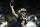 NEW ORLEANS, LOUISIANA - JANUARY 07: Derek Carr #4 of the New Orleans Saints throws the ball under pressure in the first half during a game against the Atlanta Falcons at Caesars Superdome on January 07, 2024 in New Orleans, Louisiana. (Photo by Chris Graythen/Getty Images)