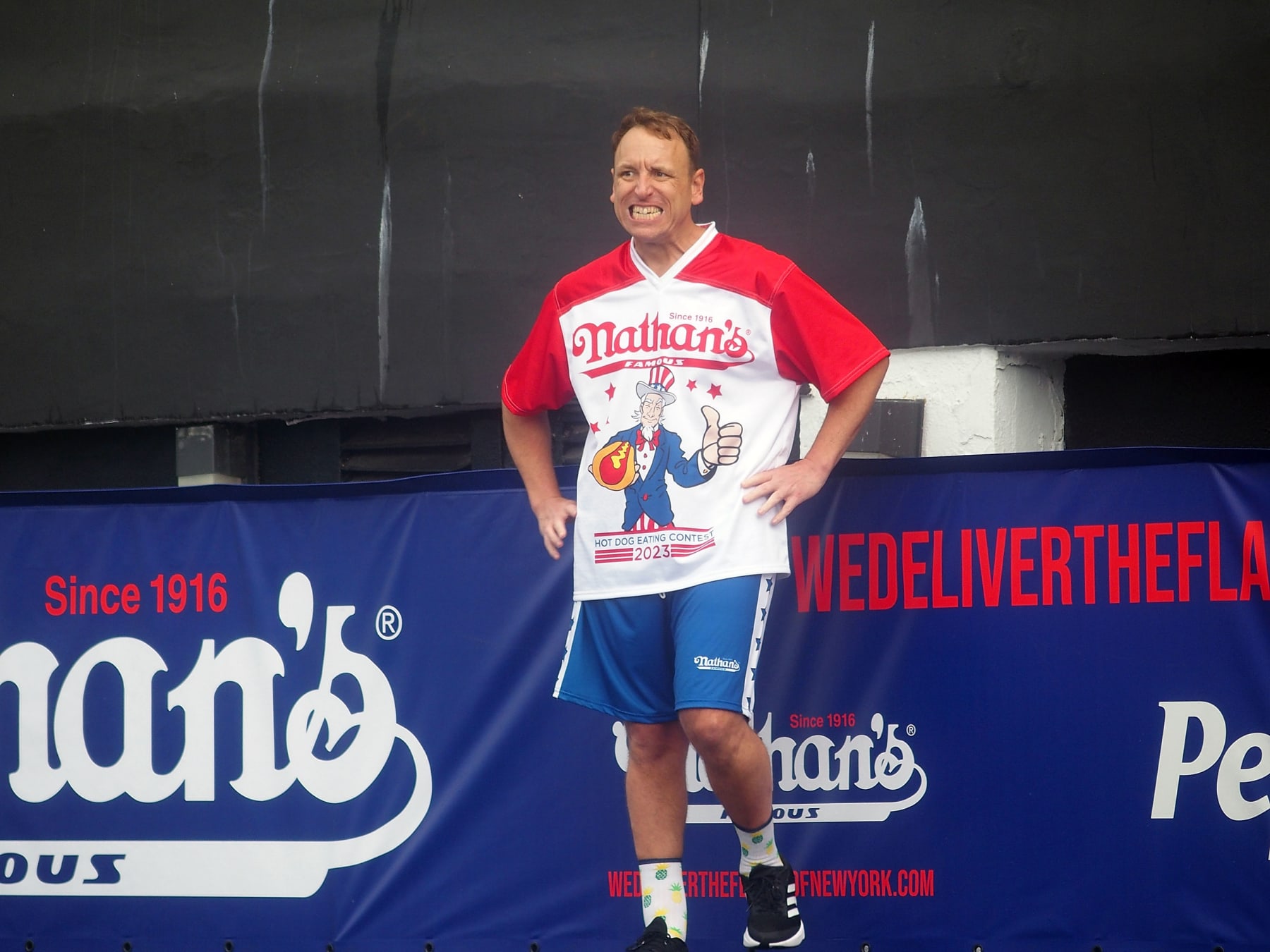 NEW YORK - JULY 4: Defending champion Joey Chestnut competes in the 2023 Nathan's Famous International Hot Dog Contest at Coney Island on July 4, 2023 in New York City. (Photo credit: Bobby Bank/Getty Images)